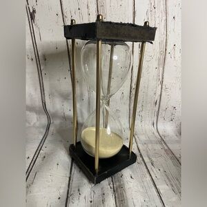 Decorative Hourglass with Gold Accents and Black Frame